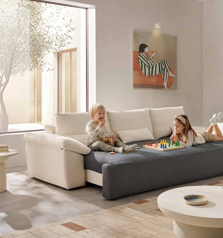 Sofá Bandera de Acomodel con el sistema deslizante Plus abierto en modo cama